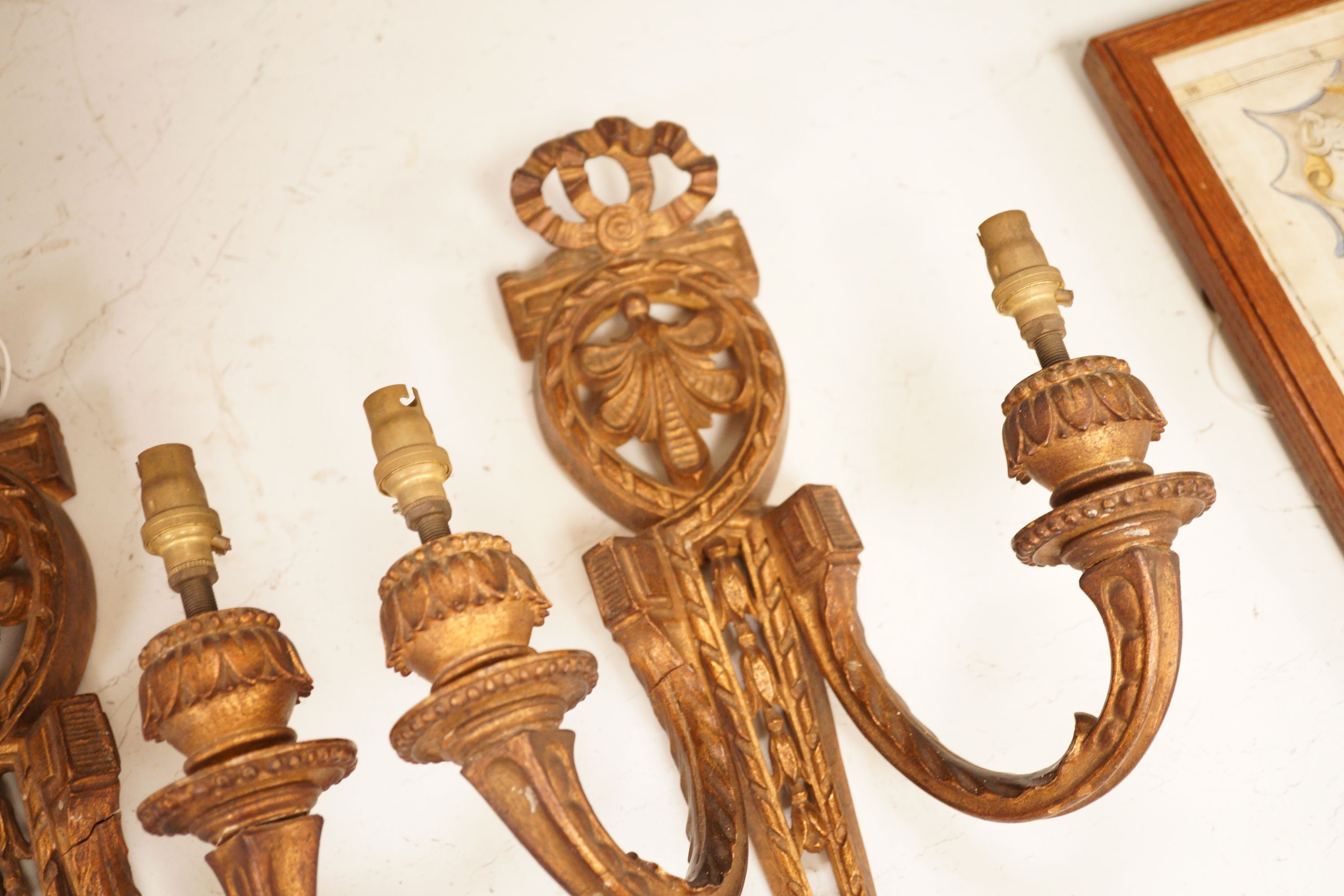 A pair of neoclassical style giltwood wall lights 45cm